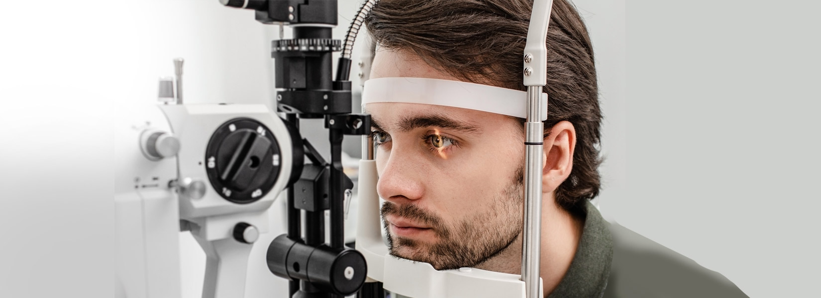 young man during eye exam in Hopkinton